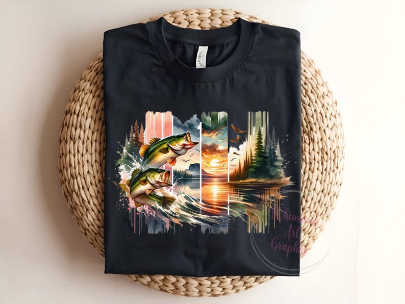 May include: A black t-shirt with a graphic print of two bass jumping out of the water. The graphic is a watercolor style with a sunset and trees in the background.