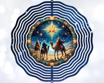 May include: A blue metal wind spinner with a circular design featuring a stained glass image of the three wise men following a star. The star is a bright yellow with a white center and is surrounded by a blue night sky with white stars.
