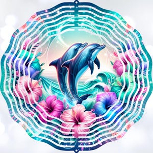 May include: A colorful metal wind chime featuring two dolphins jumping out of the water with a background of pink, blue, and green hibiscus flowers.
