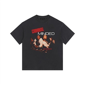 May include: Dark grey t-shirt with the words "CRIMINAL MINDED" in red and white, above a sepia-toned image of two people. The shirt also includes the text "Boogie Down Productions".