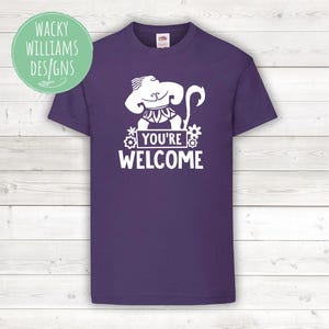 May include: Purple t-shirt with a white graphic of a cartoon character with the text "You're Welcome".
