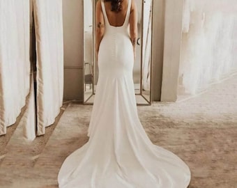 Elegant open back wedding dress with buttons