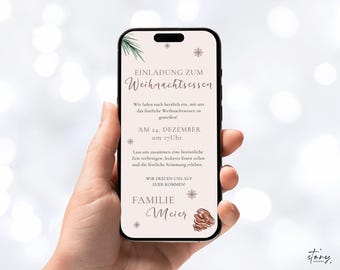 May include: A smartphone displays a Christmas dinner invitation. The invitation features text in German, with a festive design including snowflakes and a pine branch. The invitation is held in a hand.