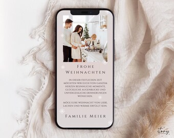 May include: A pink and white digital phone screen with a Christmas greeting that reads "Frohe Weihnachten" and a message wishing for a happy holiday season from the Meier family. The image shows a family of three in the background.