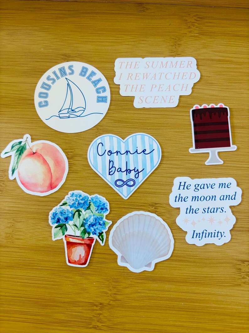 May include: A collection of stickers with various designs. Includes a sailboat, a peach, a cake, a seashell, a heart with text, and a flower pot. Text includes "Cousins Beach", "The Summer I Rewatched The Peach Scene", "Connie Baby", and "He gave me the moon and the stars. Infinity."