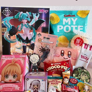 May include: A collection of Japanese snacks and character merchandise, including a Hatsune Miku figure, Calbee potato chips, Pocky, and various anime-themed items. The image includes text that says "Premium Size Example".