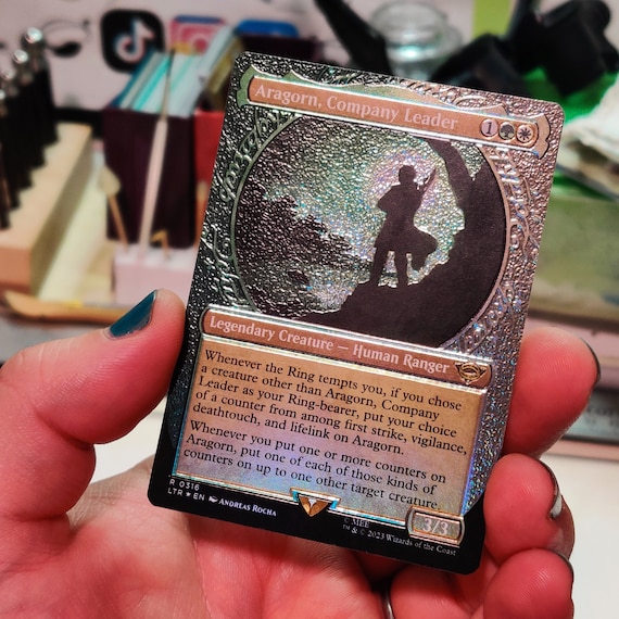 MTG 袖の下【Foil】 Gold-Forged Thopteryx (Showcase) (Halo Foil) | March of the