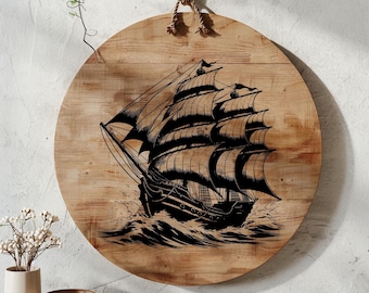 May include: A circular wooden wall plaque featuring a black ink illustration of a multi-masted sailing ship navigating through waves. The natural wood grain is visible throughout the round surface, which is suspended by a thick rope hanger.