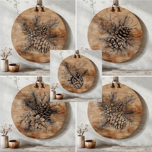 May include: Four round wooden signs with black ink illustrations of pine cones and branches. The signs are hanging on a white wall with a rustic wood background.