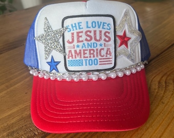 USA America trucker hat. She Loves Jesus and America too