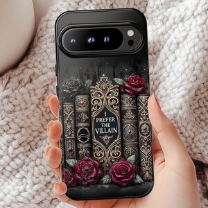 Book lover holding gothic Google Pixel phone case with villain quote design, perfect for dark romance readers and BookTok fans