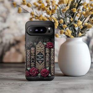 Dark romance phone case with gothic book stack artwork and red roses, featuring “I Prefer the Villain” villain reader design