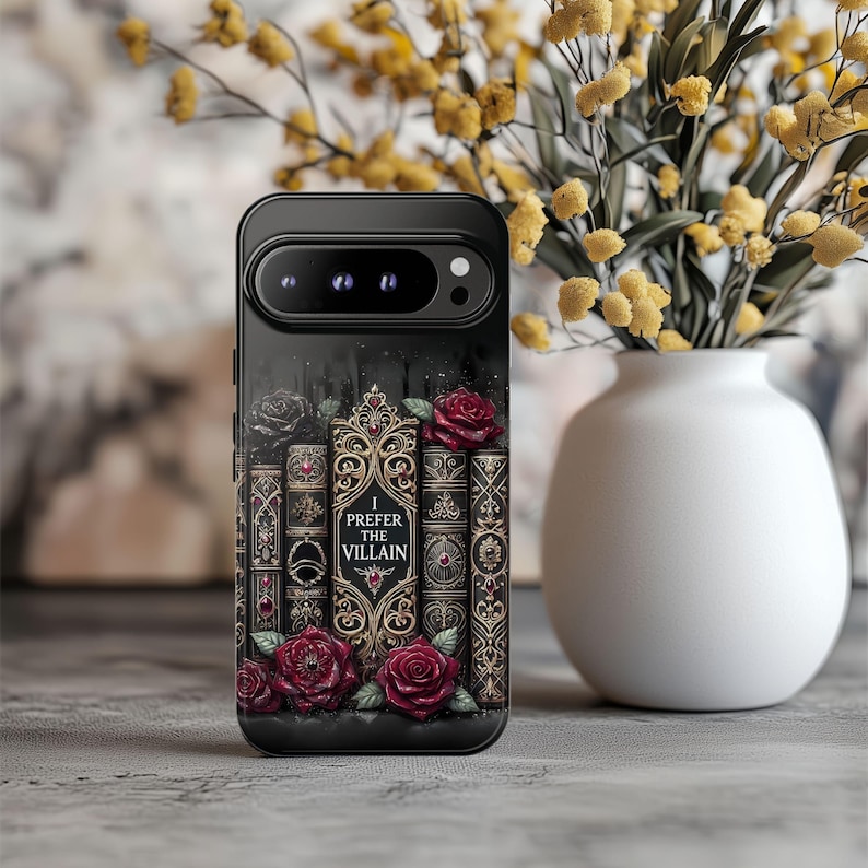 Dark romance phone case with gothic book stack artwork and red roses, featuring “I Prefer the Villain” villain reader design