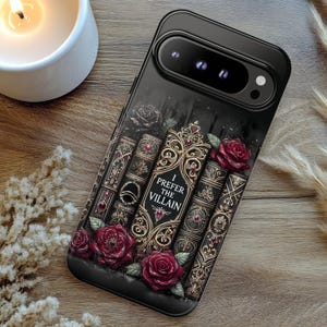 Dark romance phone case with gothic book stack artwork and red roses, featuring “I Prefer the Villain” villain reader design