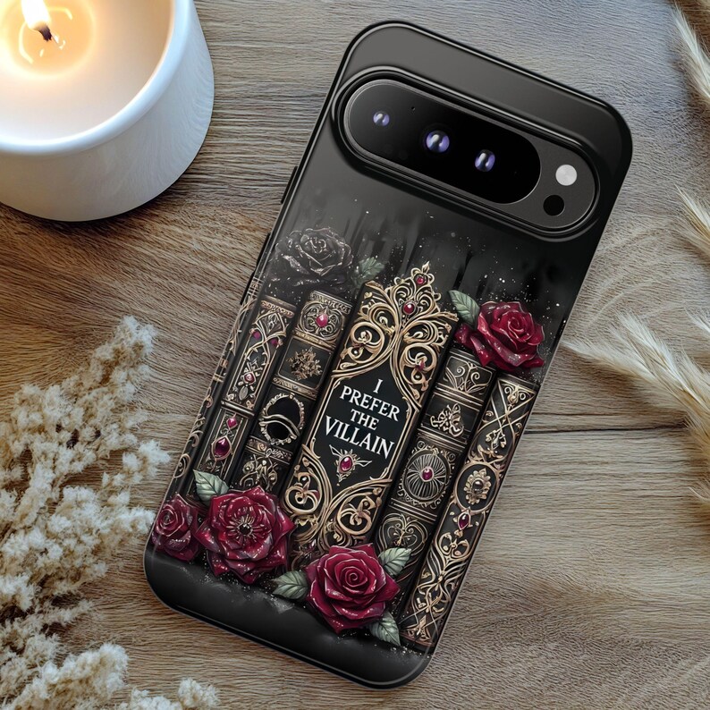 Dark romance phone case with gothic book stack artwork and red roses, featuring “I Prefer the Villain” villain reader design