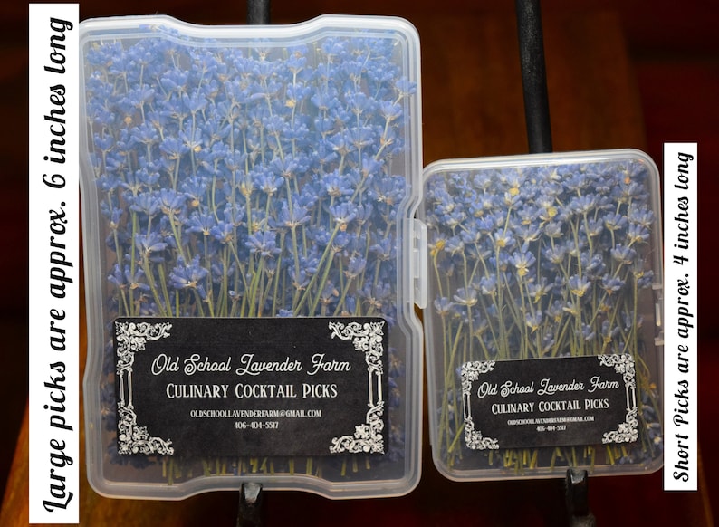 May include: Two clear plastic containers filled with dried lavender flower sprigs. The containers are labeled "Old School Lavender Farm Culinary Cocktail Picks". The larger container holds sprigs that are approximately 6 inches long, while the smaller container holds sprigs that are approximately 4 inches long.