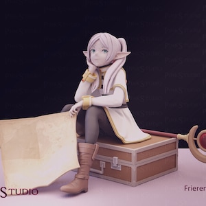 May include: A white and gold-trimmed elf figurine with long, white hair, sitting on a brown suitcase with a map in her lap. She is holding a staff with a red gem at the top. The text "Frieren" is visible in the lower right corner of the image.