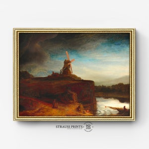 May include: A framed painting depicting a windmill perched on a cliff overlooking a river. The sky is stormy, the water choppy, and there are figures in the foreground. The painting is presented in a gold frame.