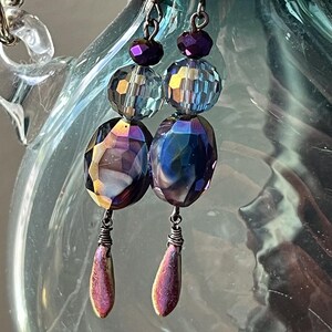 Iridescent violet dangle earrings