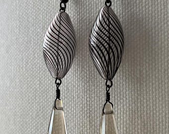 Black-swirled Venetian glass earrings with champagne crystal dangles