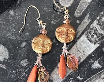 Golden glass moon dangle earrings