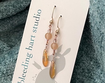 Delicate peachy gold glass earrings