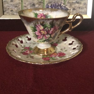 Stunning hand decorated Shafford cup and saucer