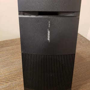 One Bose Model 100 Bookshelf Type Surround Speaker Black