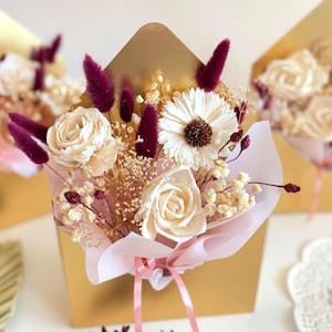 Flower Arrangement.Dried Flowers.Gift for mom.Gift box in the form of envelope.Bouquet of flowers in a golden box.Bouquet with Dried flowers