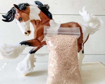 Sawdust for your Breyer horse stall!! Includes sawdust.