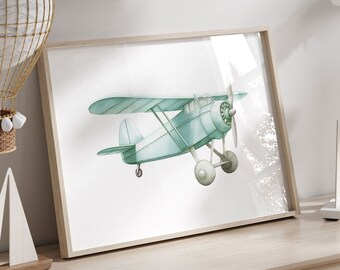 May include: A framed print of a light blue airplane with white accents against a white background. The print is hanging on a light wood dresser with white paper clouds hanging from the ceiling above.