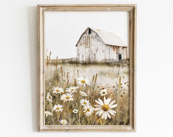 May include: A framed watercolor painting of a white weathered barn with a field of white daisies in the foreground. The barn is set against a light blue sky.