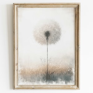May include: A framed watercolour painting of a dandelion with a white and grey background. The dandelion is in the centre of the painting and is surrounded by a field of smaller dandelions.