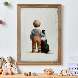 May include: A framed print depicts a young child in brown overalls and a blue shirt, wearing a cap, with their arm around a black and white dog. The artwork has a rustic, vintage feel. The frame is made of wood.