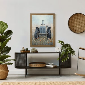 May include: A framed painting of a blue vintage tractor in a field of wildflowers. The tractor is facing the viewer and is surrounded by a variety of flowers in shades of orange, pink, and yellow. The painting is set against a white wall and is displayed on a black metal shelf with a woven basket and books.
