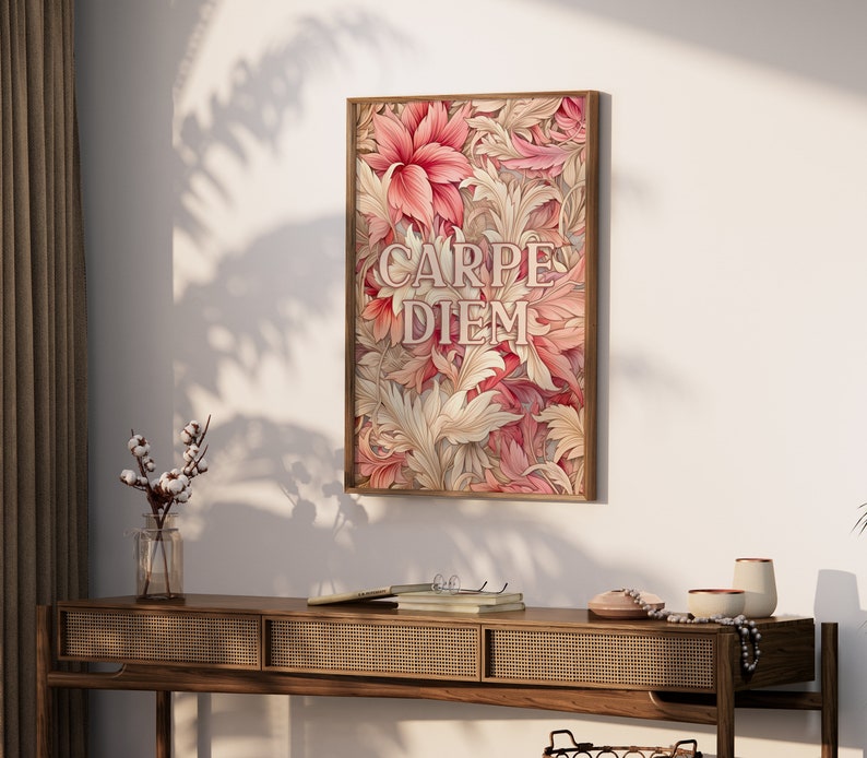 May include: A framed print with a floral design in shades of pink and cream. The print features the Latin phrase "Carpe Diem" in a stylized font.