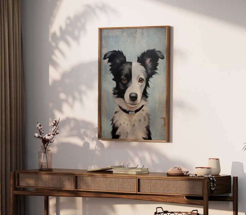 K&ouml;nnte beinhalten: Ein gerahmtes Gem&auml;lde eines schwarz-wei&szlig;en Border Collies vor wei&szlig;em Hintergrund. Der Hund schaut den Betrachter mit einem neugierigen Ausdruck an.