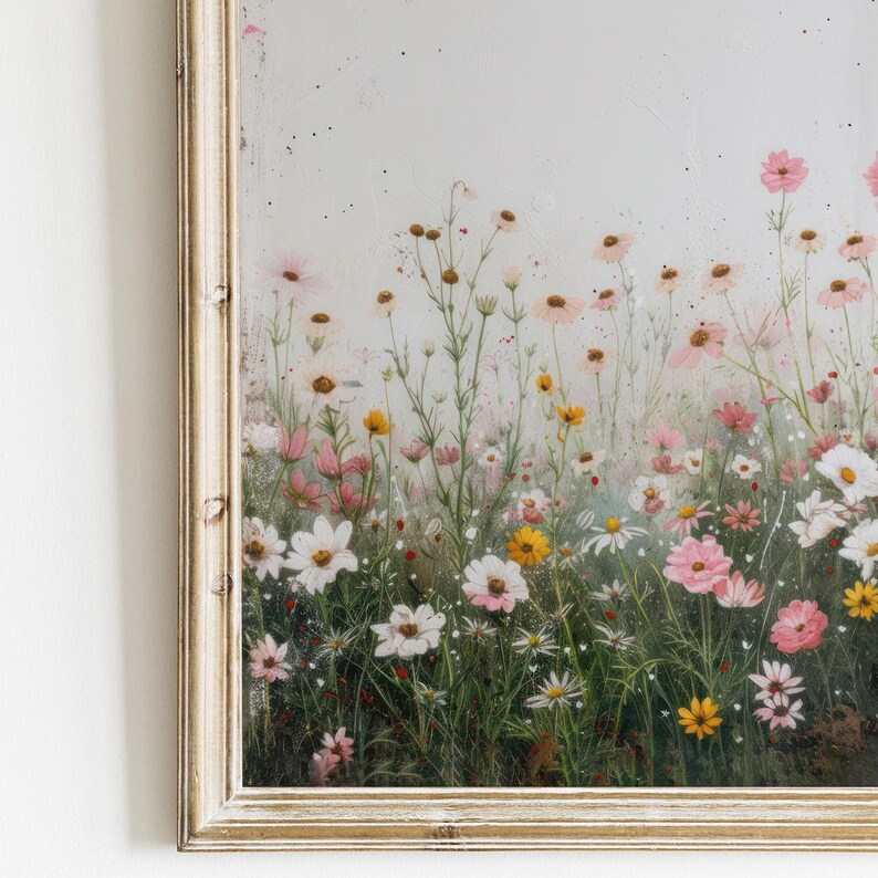 May include: A framed painting of a field of pink, white, and yellow wildflowers. The flowers are painted in a realistic style and are set against a white background.