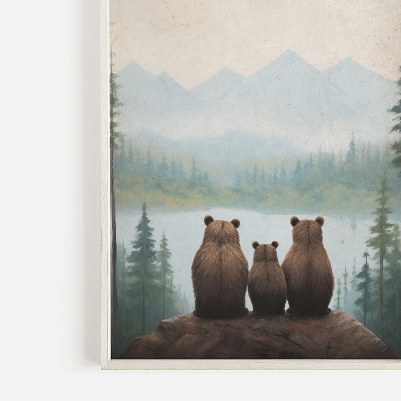 May include: Three brown bears sitting on a rock overlooking a misty lake and mountains in the distance. The bears are facing away from the viewer, with the largest bear in the center and two smaller bears on either side.