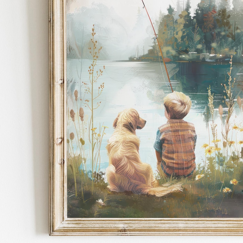 May include: Framed art print depicting a boy and a golden retriever dog fishing by a lake. The boy wears a plaid shirt, and the dog sits beside him. The artwork has a soft, painterly style with a serene, natural setting.