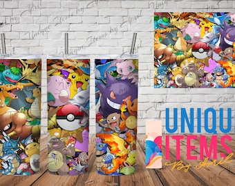 May include: A cylindrical tumbler with a metal straw featuring a colorful collage of various animated creatures and a red and white ball icon. The design includes characters like a purple ghost, a yellow electric creature, and a blue water dragon.