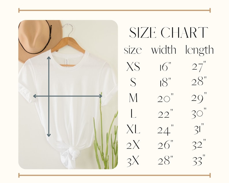 May include: A white t-shirt hanging on a wooden hanger, with a size chart displayed to the right. The size chart lists sizes XS to 3X, with corresponding width and length measurements in inches. A beige hat is visible in the background.