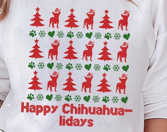May include: White sweatshirt with a Christmas-themed design featuring a repeating pattern of red and green Christmas trees, snowflakes, hearts, and paw prints. The design also includes a row of small, red-hatted Chihuahua dogs. The text "Happy Chihuahua-lidays" is printed below the design.