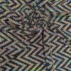 Geometric Chevron design iridescent sequins on metallic Nylon spandex 4-way stretch 58/60” Sold by the YD. High quality fabrics by EthanLASp