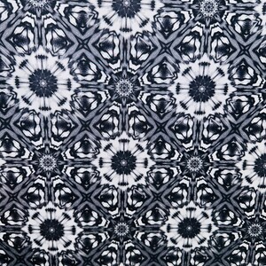 May include: Black and white abstract pattern with a repeating geometric design. The pattern features a series of interlocking circles and squares.
