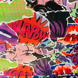 Comics design Multicolor print on great quality of nylon power mesh 4-way stretch 58/60” Sold by the YD.