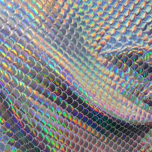 Mermaid design iridescent white silver metallic nylon spandex 4-way stretch 58/60” High quality fabrics by EthanLASpandex
