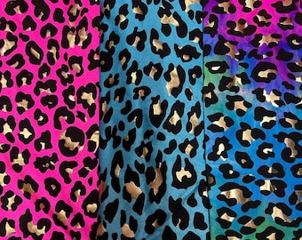 Exotic Leopard design metallic nylon spandex 4-way stretch 58/60” Sold by the YD. Ships worldwide from Los Angeles California USA