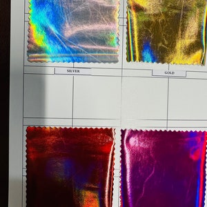 Iridescent Deluxe stretch vinyl high quality super shiny vinyl 4-way stretch 58/60” Sold by the YD. Ships worldwide from Los Angeles