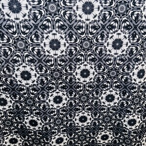 May include: Black and white fabric with a repeating geometric pattern. The pattern features a series of interlocking circles and squares.
